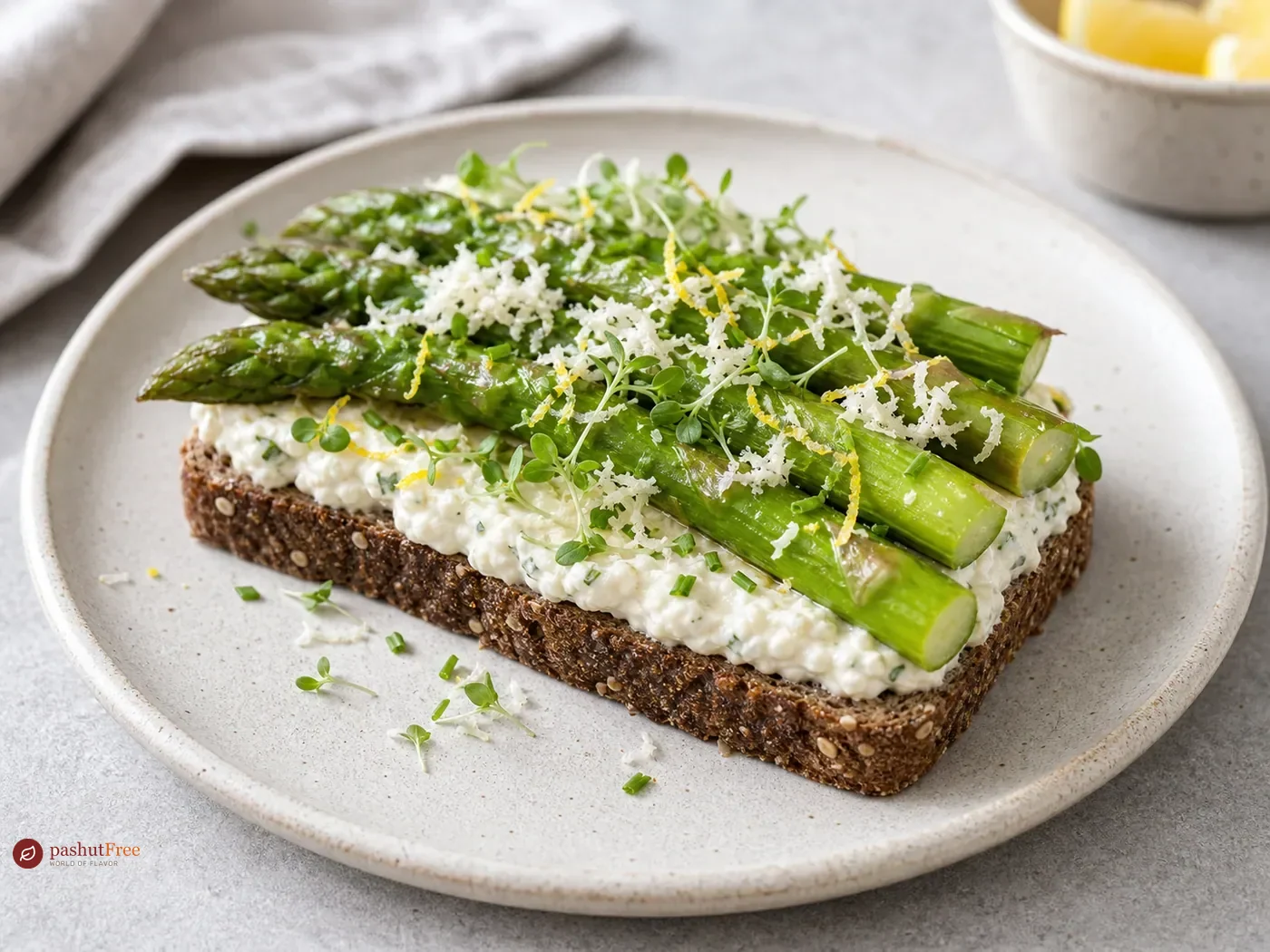 Nordic smorrebrod with asparagus and horseradish cream on rye bread